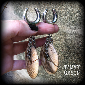 Featuring a pair of gorgeous streaky picture jasper donut gemstones cradled in sturdy stainless steel chain links, these gauged earrings weigh approx 32 grams a piece and measure just under 10cms from tip to tip.

This pair have been made on 3/4" gauge (19mm) surgical steel cradles, suitable for stretched lobes.