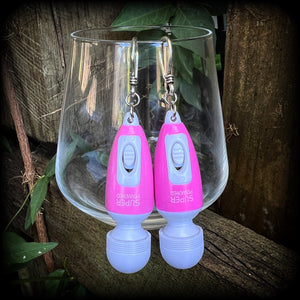 Pink vibrator earrings 