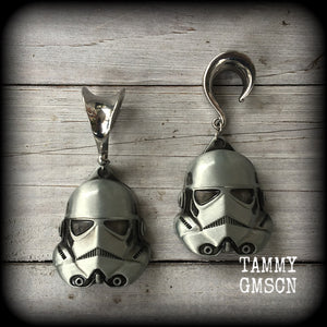 Measuring approx 8cms from tip to tip, these Storm Trooper ear hangers are nice and big, and nice and dangly, weighing around 26 grams each.

This pair has been made on 5/8" gauge (16mm) surgical steel saddles, suitable for stretched lobes.