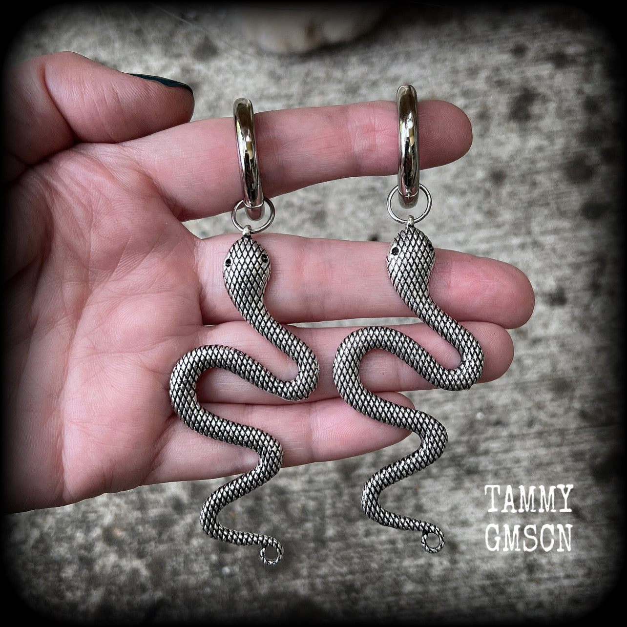 Silver snake gauged hoop earrings-Snap rings