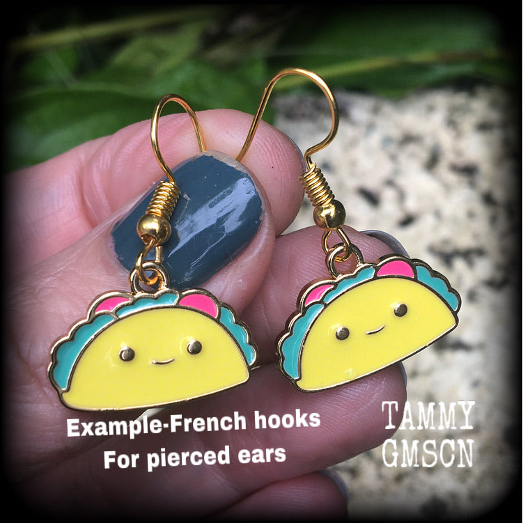 This adorable pair of earrings features cute little happy taco charms, measuring approx 3cms from tip to tip and weighing only a few grams each. These earrings are too cute!

This pair has been made on antique gold french hooks, for pierced ears.