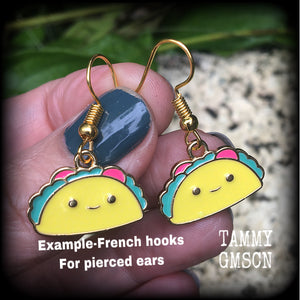 This adorable pair of earrings features cute little happy taco charms, measuring approx 3cms from tip to tip and weighing only a few grams each. These earrings are too cute!

This pair has been made on antique gold french hooks, for pierced ears.