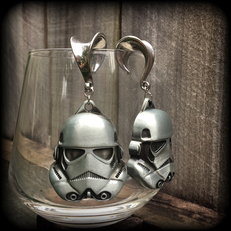 Measuring approx 8cms from tip to tip, these Storm Trooper ear hangers are nice and big, and nice and dangly, weighing around 26 grams each.

This pair has been made on 5/8" gauge (16mm) surgical steel saddles, suitable for stretched lobes.