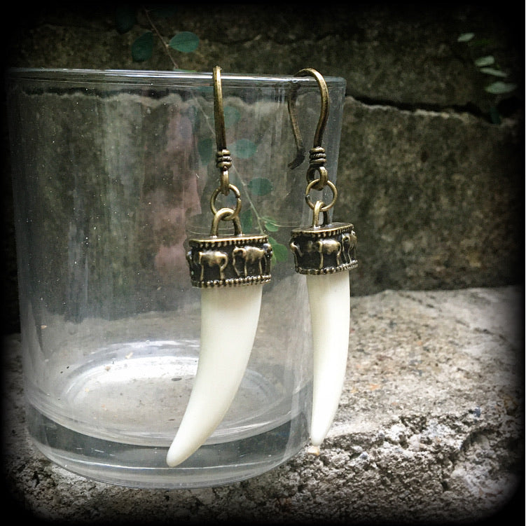 Animal hot sale tooth earrings