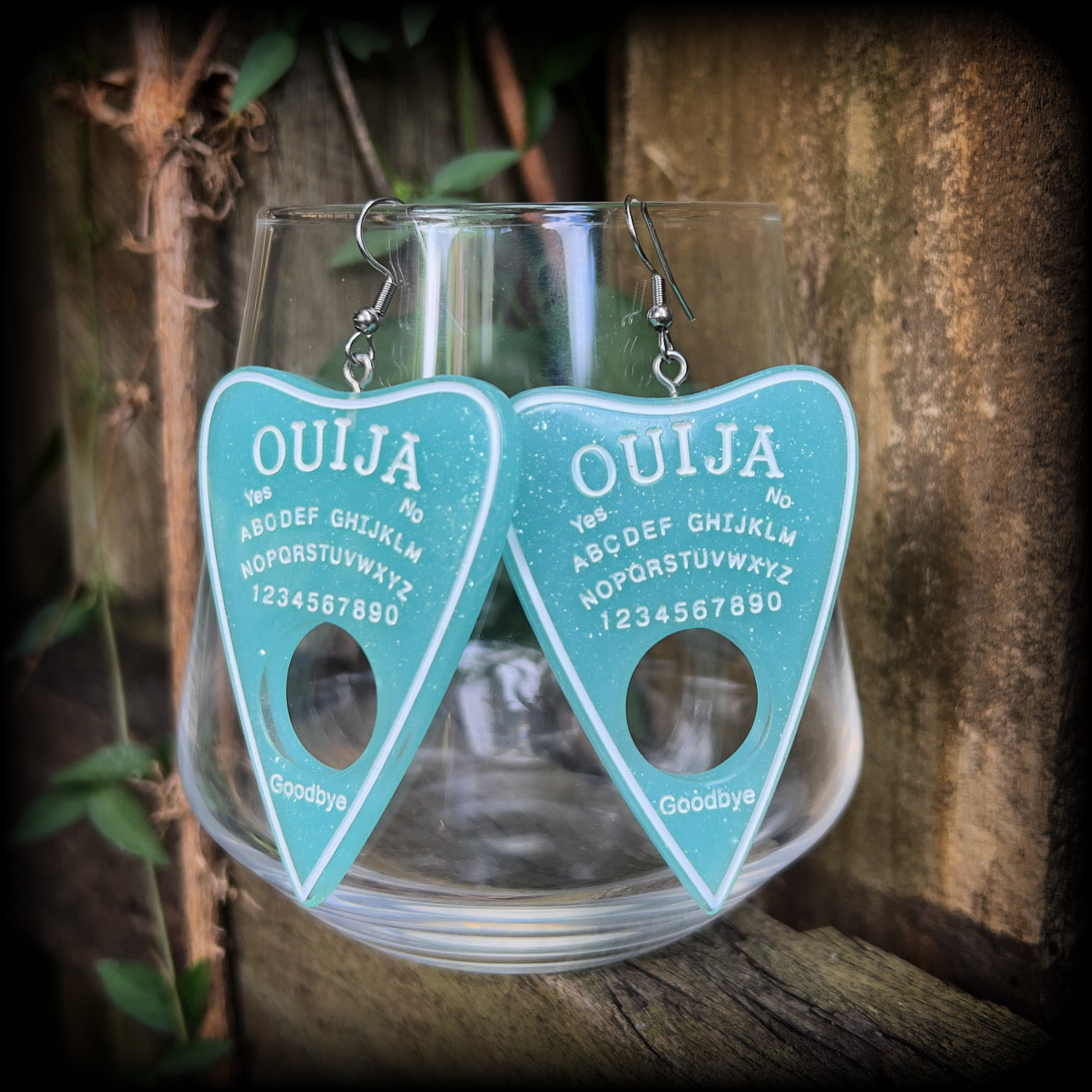 These gorgeous oversize baby blue pastel goth planchette earrings are big and dangly!!!
Weighing in at 8 grams each and measuring just under 8 cms from tip to tip.

This pair of earrings have been made on stainless steel french hooks, suitable for pierced ears.