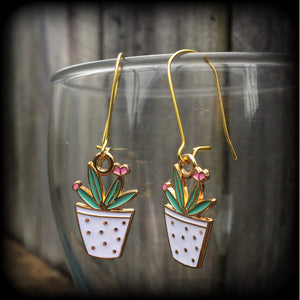 Cactus earrings Succulent earrings Aloe vera earrings Snake plant Crazy plant people Pierced ears Ear gauges Ear hangers Tunnels Plugs Green CIPPA earrings Cactus jewelry Desert earrings Trailer trash jewelry Retro earrings Kitsch earrings
