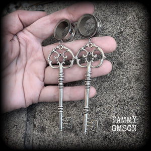 Antique silver key tunnel earrings