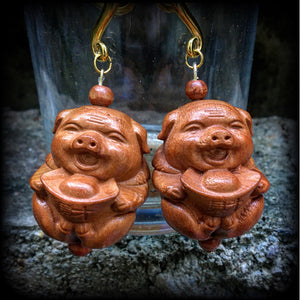 Carved wood pig earrings-Gauged earrings