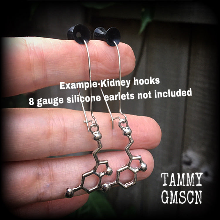 These cute little antique silver Serotonin molecule earrings measure just under 5cms from tip to tip, and are super light weight at only a few grams each.

This pair have been made with stainless steel kidney hooks.