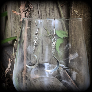 Featuring super cute super lightweight antique silver grim reaper scythes, these earrings are lovely and petite, measuring just under 5cms from tip to tip and weigh only a gram or two each.

This pair has been made with stainless steel french hooks, for pierced ears.