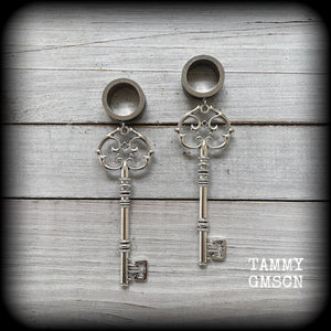 Antique silver key tunnel earrings