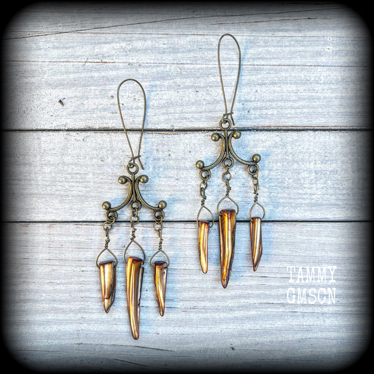 Antique bronze and shell tusk earrings