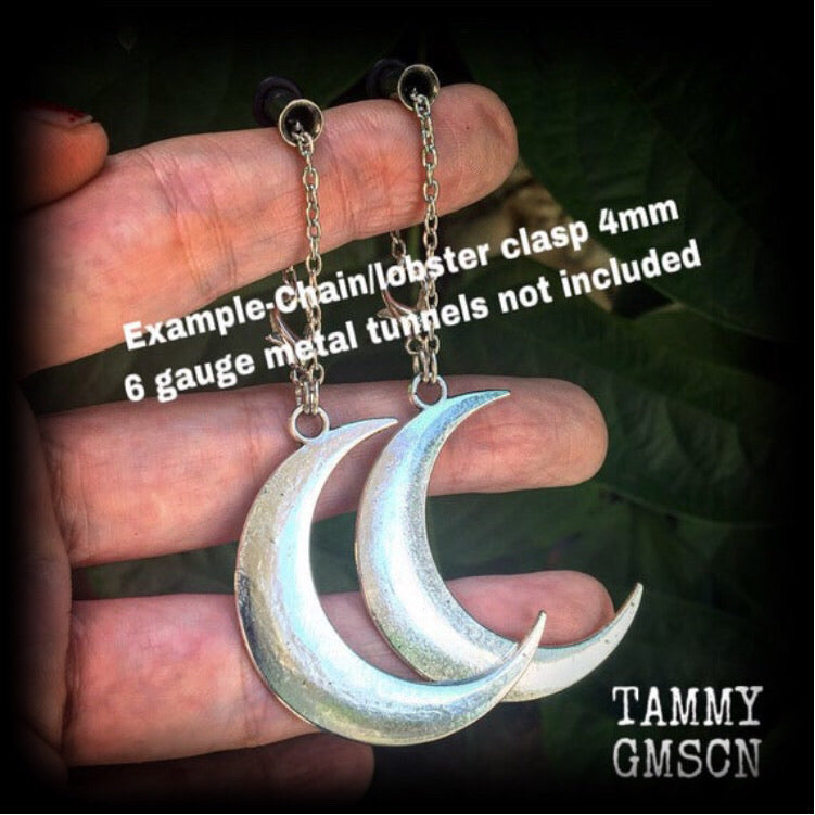 Crescent moon tunnel earrings