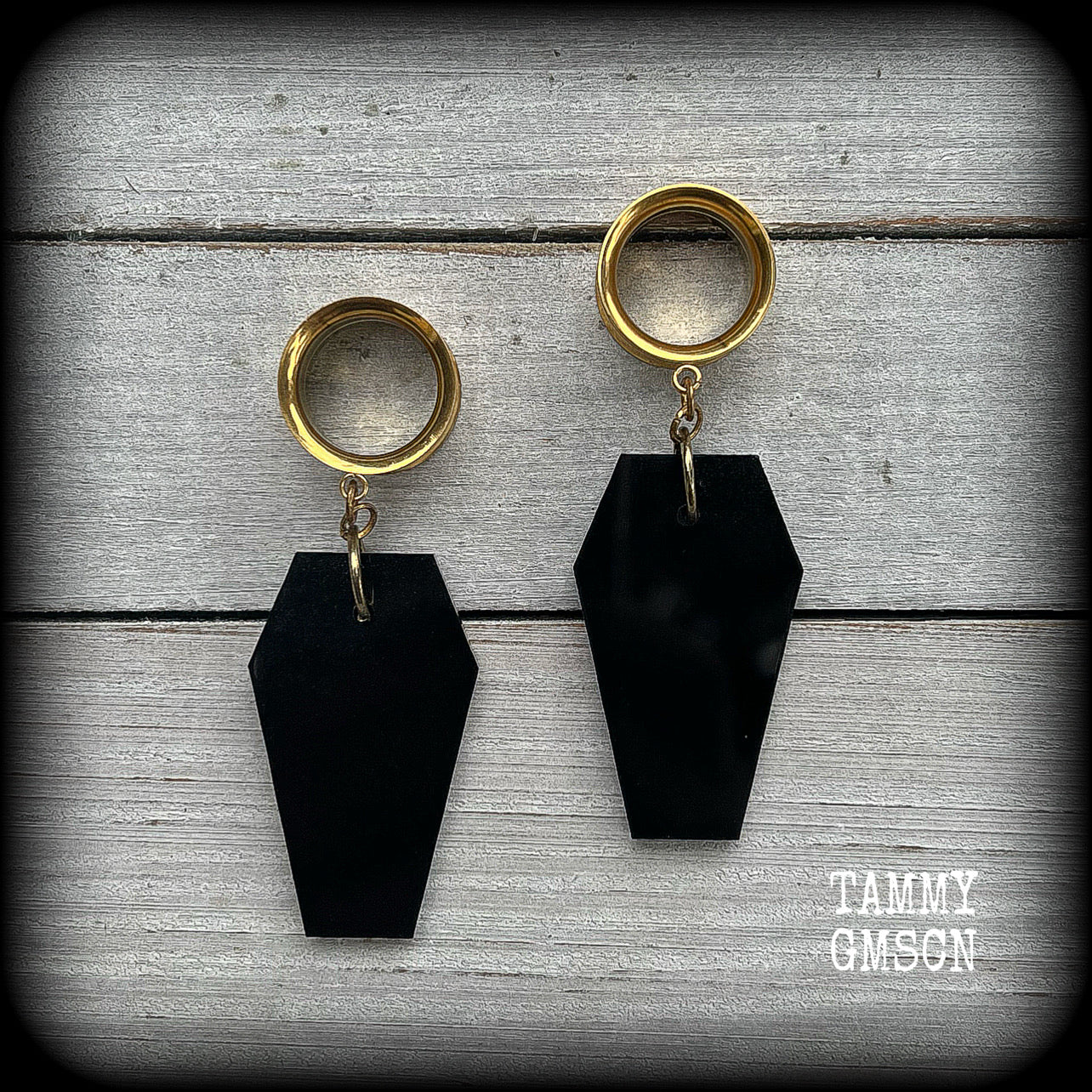 Black coffin tunnel earrings