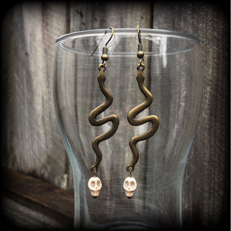 Bronze snake and stone skull earrings