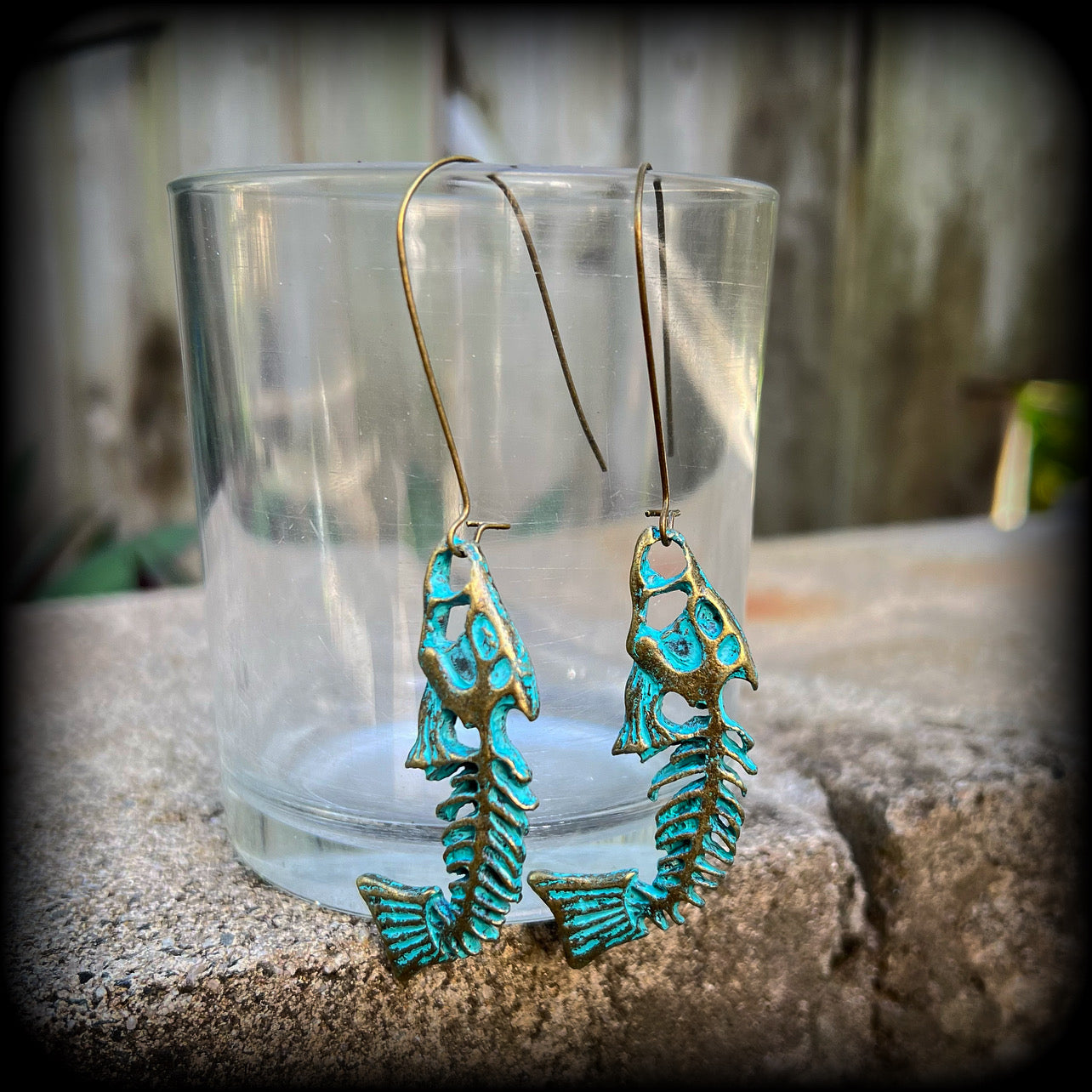 Patina fish skeleton earrings