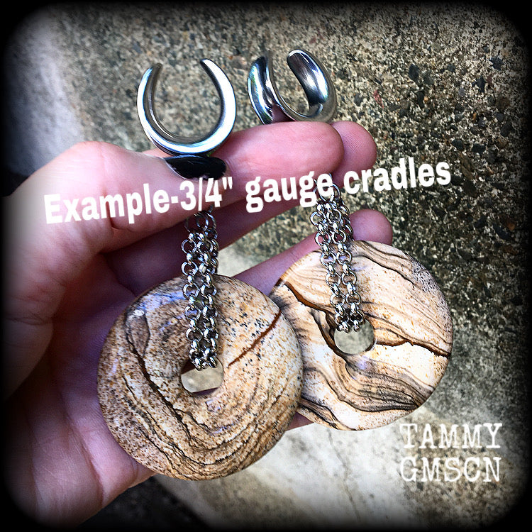 Featuring a pair of gorgeous streaky picture jasper donut gemstones cradled in sturdy stainless steel chain links, these gauged earrings weigh approx 32 grams a piece and measure just under 10cms from tip to tip.

This pair have been made on 3/4" gauge (19mm) surgical steel cradles, suitable for stretched lobes.