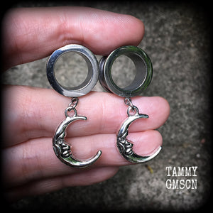 These gorgeous tunnel dangles feature whimsical antique silver crescent moons, are light weight, weighing in at 7 grams each and measure 4 cms from tip to tip.
This pair has been made with 9/16" (14mm) gauge surgical steel screw fit tunnels-suitable for stretched lobes.