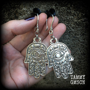 These antique silver Hamsa hand earrings weigh 10 grams each, measuring 7cms from tip to tip.
This pair has been made on small antique silver shephard hooks, suitable to be worn through stretched lobes with silicone earlets from 8 gauge (3mm).