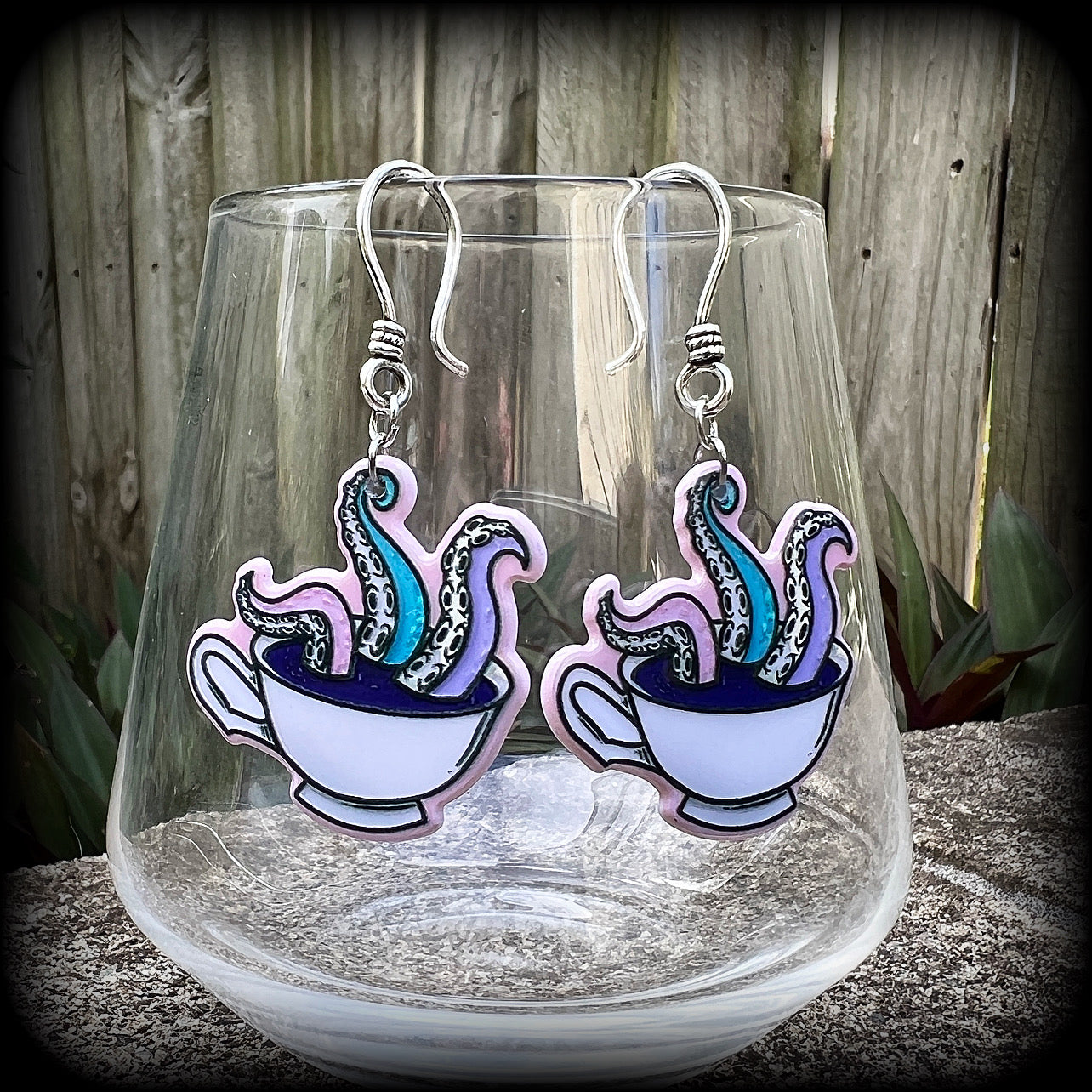 Pastel goth tentacles and teacup earrings