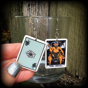 These earrings feature a lightweight Rider Waite ‘The Devil’ tarot card charm, measuring just over 6cms from tip to tip and weighing only a few grams each.

This pair has been made with stainless steel french hooks, for pierced ears.