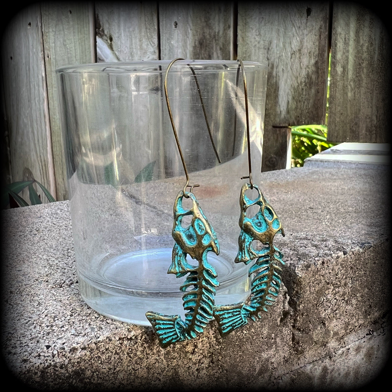 Patina fish skeleton earrings