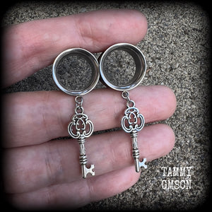 Antique silver key tunnel earrings