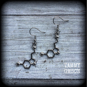 These cute little antique silver Serotonin molecule earrings measure just under 5cms from tip to tip, and are super light weight at only a few grams each.

This pair have been made with stainless steel french hooks, to be worn in pierced ears.