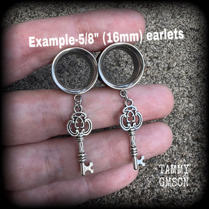 Antique silver key tunnel earrings