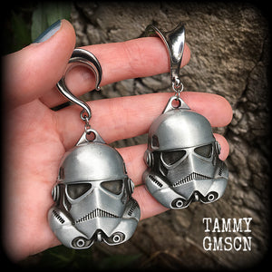 Measuring approx 8cms from tip to tip, these Storm Trooper ear hangers are nice and big, and nice and dangly, weighing around 26 grams each.

This pair has been made on 5/8" gauge (16mm) surgical steel saddles, suitable for stretched lobes.