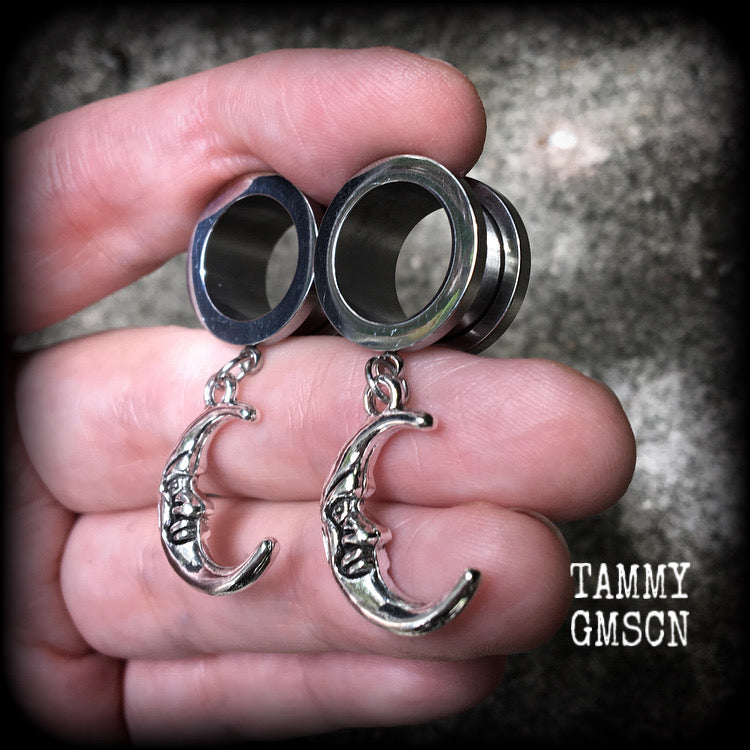 These gorgeous tunnel dangles feature whimsical antique silver crescent moons, are light weight, weighing in at 7 grams each and measure 4 cms from tip to tip.
This pair has been made with 9/16" (14mm) gauge surgical steel screw fit tunnels-suitable for stretched lobes.