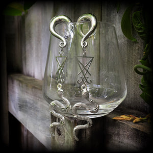 These gorgeous 'Snake and Sigil' gauged earrings feature an antique silver snake (Lilith) hanging from a stainless steel Sigil of Lucifer charm.
These are nice and dangly at 12cms from tip to tip and weigh approx 20 grams each, not too heavy.
This pair have been made on 0 gauge (8mm) surgical steel full curl hooks, suitable for stretched lobes.