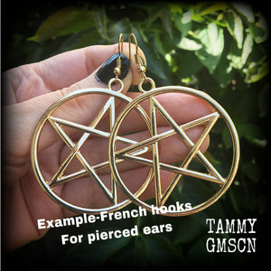 These are beautiful earrings feature large champagne gold pentagrams ,light weight (weighing only a few grams each) and nice and dangly, measuring just on 8cms from tip to tip.

This pair has been made on antique gold french hooks, suitable for pierced ears.