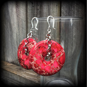 These gorgeous deep pink Ocean jasper earrings weigh in at 32 grams a piece, and hang just on 9cms from tip to tip, made with small antique silver shephard hooks, to be worn in silicone earlets in stretched lobes from 8 gauge (3mm).