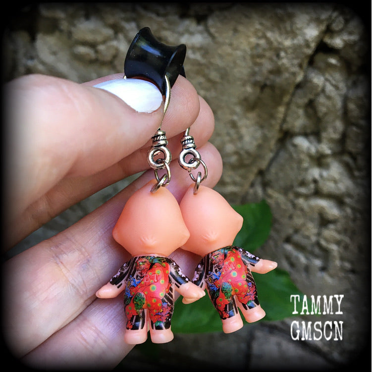 Tattooed Kewpie dolls Ear gauges