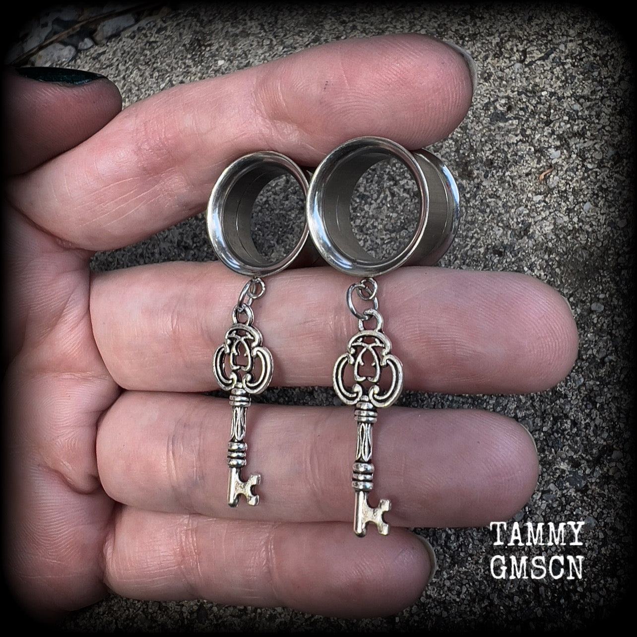 Antique silver key tunnel earrings