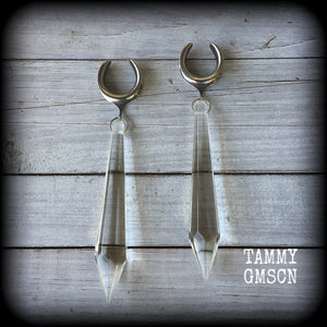 These gorgeous dangly glass earrings have been made with gorgeous faceted clear glass spears, measuring 13 cms from tip to tip, and weighing approx 13 grams each.

These earrings have been made on 3/4" gauge (19mm) surgical steel cradles, to be worn in stretched lobes.