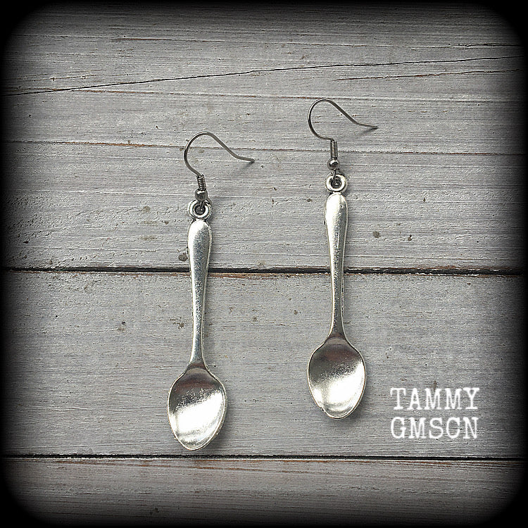 Featuring adorable little antique silver teaspoons, these earrings are super cute and super light weight, measuring just over 7cms from tip to tip and weighing a few grams each.

This pair has been made with stainless steel french hooks suitable for pierced ears.