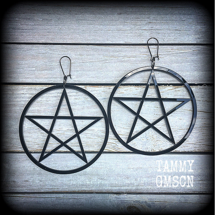 Oversized pentagram earrings