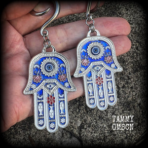 These gorgeous antique silver and enamel hamsa hand gauged earrings weigh approx 17 grams each, and measure just on 9cms from tip to tip, nice and dangly.

This pair have been made on 2 gauge (6mm) surgical steel full curl hooks, to be worn in stretched lobes.
