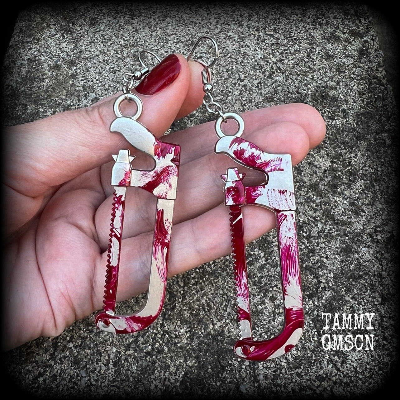 Bone saw earrings Hack saw earrings Halloween earrings Murder weapon True crime earrings Blood spatter Horrorpunk earrings Haooror punk jewelry Horror movies Slasher movies Pierced ears Ear gauges Mortuary equipment Medical instruments Zombie earring