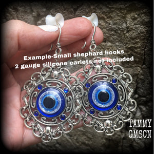 Evil eye earrings-Esoteric tunnel earrings