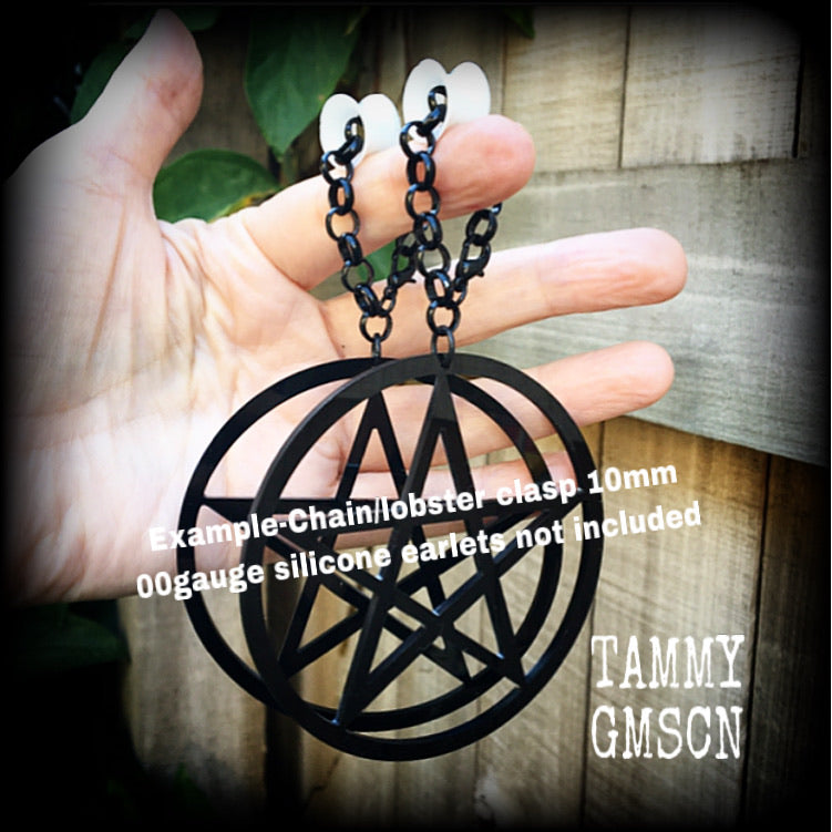 Oversized pentagram earrings