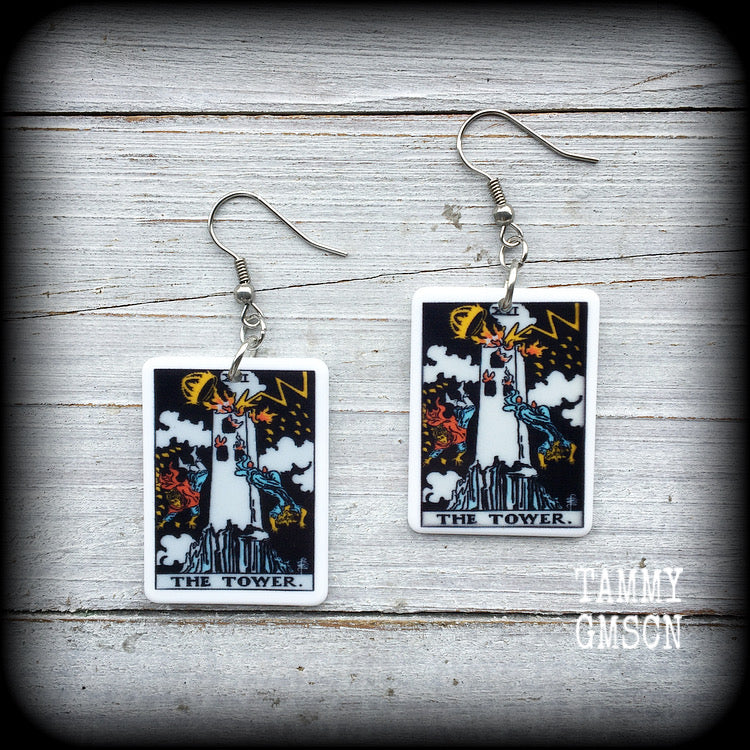 This pair of earrings features a classic Rider Waite ‘The Tower’ acrylic tarot card, measuring just over 6cms from tip to tip, and weighing only a gram or two each.

This pair has been made with stainless steel french hooks, for pierced ears.
