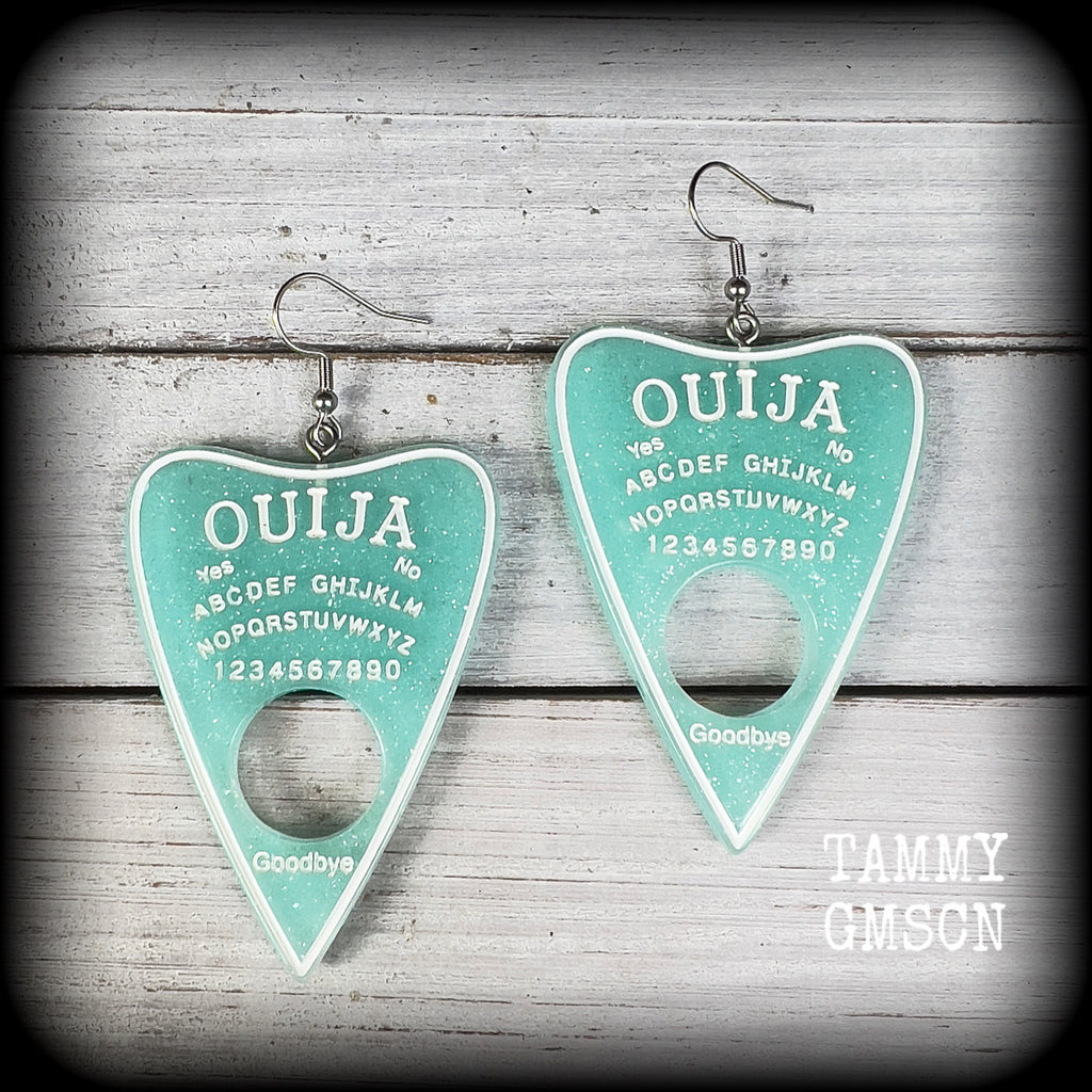 These gorgeous oversize baby blue pastel goth planchette earrings are big and dangly!!!
Weighing in at 8 grams each and measuring just under 8 cms from tip to tip.

This pair of earrings have been made on stainless steel french hooks, suitable for pierced ears.