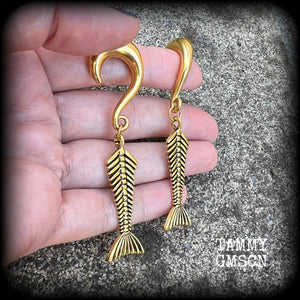 Skeletal mermaid tail gauged earrings