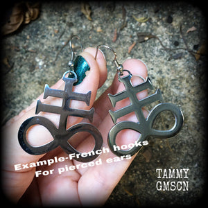 These gorgeous earrings feature large stainless steel Sigil of Sulphur pendants, measure just under 6 cms from tip to tip, and weigh approx 6 grams each.

This pair have been made with stainless steel french hooks, for pierced ears.