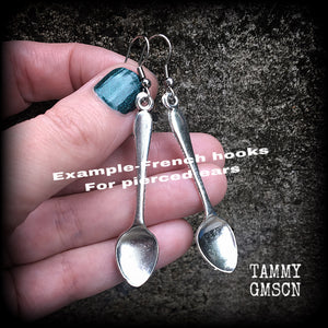 Featuring adorable little antique silver teaspoons, these earrings are super cute and super light weight, measuring just over 7cms from tip to tip and weighing a few grams each.

This pair has been made with stainless steel french hooks suitable for pierced ears.