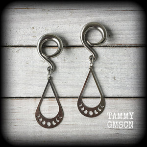 These gorgeous earrings feature stainless steel tear drop moon phase charms, measuring just on 7cms from tip to tip, and weighing only 8 grams each, not too heavy.

These gauged earrings have been made on 2 gauge (6mm) surgical steel full curl hooks, to be worn in stretched lobes.
