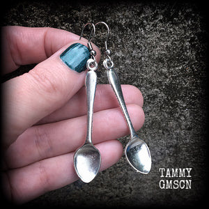 Featuring adorable little antique silver teaspoons, these earrings are super cute and super light weight, measuring just over 7cms from tip to tip and weighing a few grams each.

This pair has been made with stainless steel french hooks suitable for pierced ears.